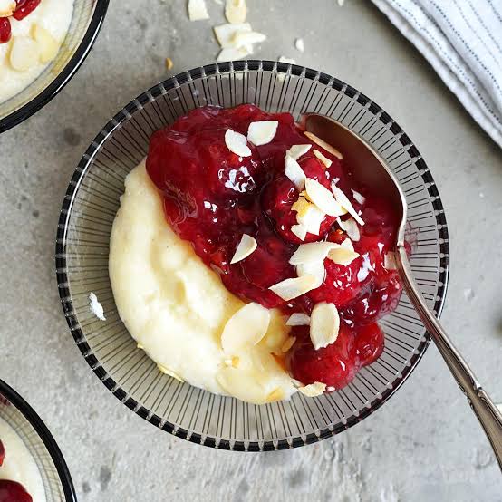Lemon coconut Semolina pudding with cherry topping
